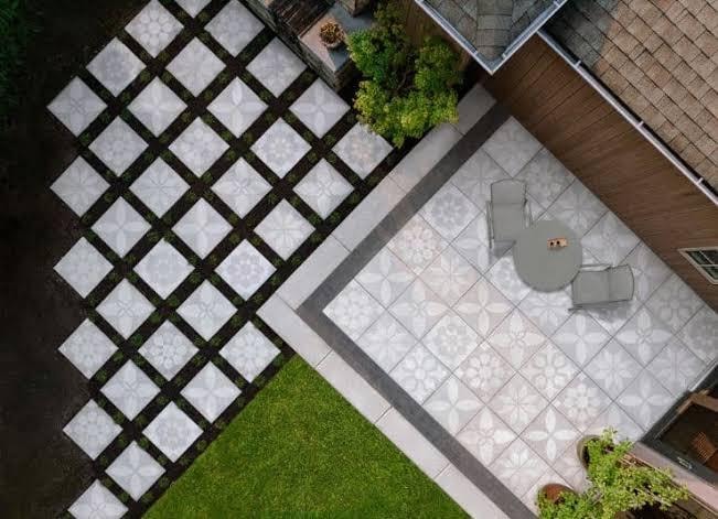 Model home exterior with stone landscape details